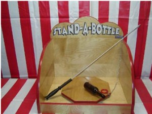 stand a bottle carnival game